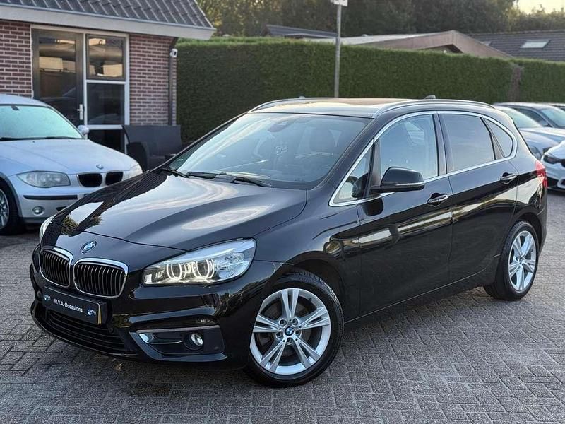 Zwart Gebruikt 2015 BMW 218 Active Tourer Luxury Line MPV | € 10.950 (Iets duurder) - Afbeelding 1/4
