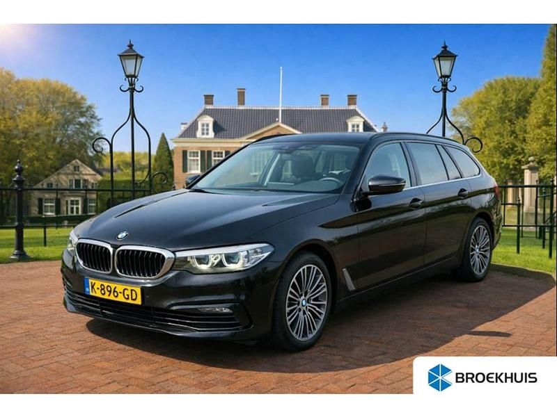 Zwart Gebruikt 2020 BMW 520 Executive Stationwagen | € 28.900 (Goede deal) - Afbeelding 1/3
