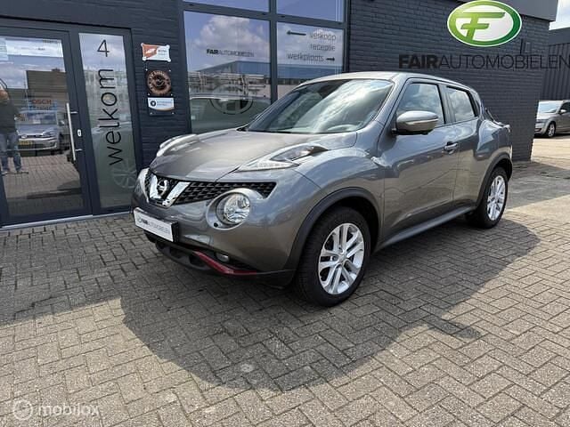 Grijs Gebruikt 2015 Nissan Juke S SUV | € 10.950 (Eerlijke prijs) - Afbeelding 1/4