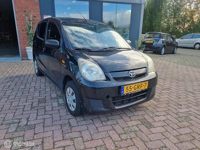 Occasion Daihatsu Cuore 69 PK (50 kW) 2008 Zwart Hatchback