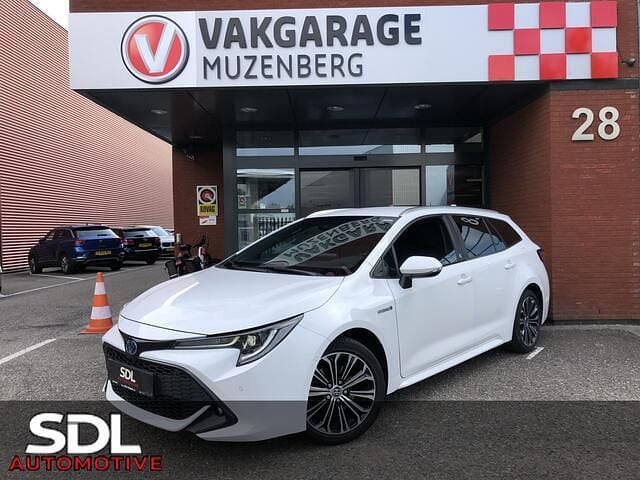 Wit Gebruikt 2021 Toyota Corolla Style Stationwagen | € 23.945 (Goede deal) - Afbeelding 1/4
