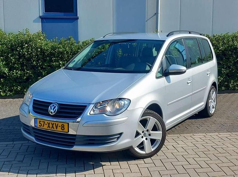 Grijs Gebruikt 2010 VW Touran Highline MPV | € 6.950 (Eerlijke prijs) - Afbeelding 1/4
