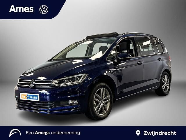Blauw (metallic) Occasion 2025 VW Touran Highline MPV | € 45.995 - Afbeelding 1/3