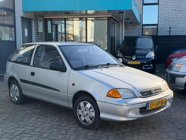 Occasion Suzuki Swift 86 PK (63 kW) 2001 Grijs Hatchback