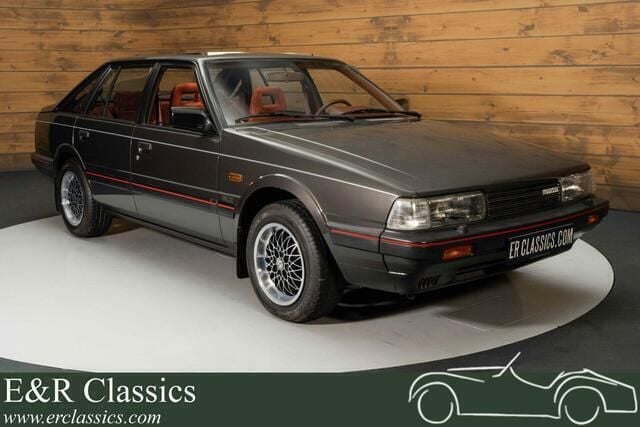 Grijs Gebruikt 1987 Mazda 626 Sedan | € 24.950 - Afbeelding 1/4