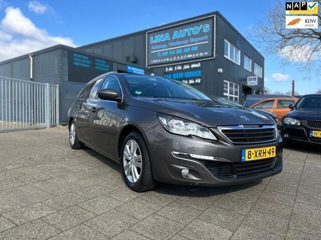Grijs Gebruikt 2014 Peugeot 308 Stationwagen | € 4.999 (Goede deal) - Afbeelding 1/4
