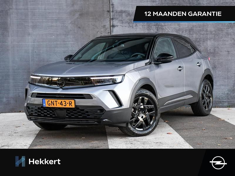 Grijs Gebruikt 2024 Opel Mokka SUV | € 27.495 - Afbeelding 1/4