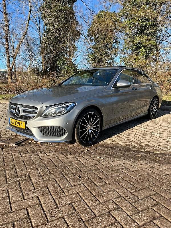 Grijs Occasion 2014 Mercedes C200 AMG line Sedan | € 15.000 (Goede deal) - Afbeelding 1/4