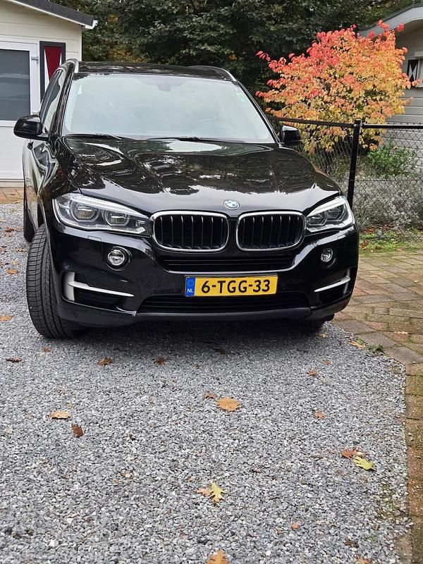 Zwart (metallic) Gebruikt 2014 BMW X5 Executive SUV | € 22.950 (Goede deal) - Afbeelding 1/4
