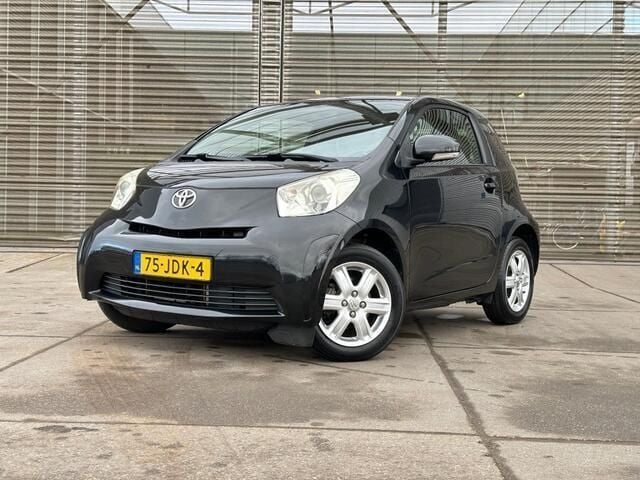 Zwart, metallic lak Gebruikt 2009 Toyota iQ Comfort Hatchback | € 4.950 (Iets duurder) - Afbeelding 1/4