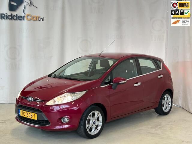 Rood Gebruikt 2012 Ford Fiesta Titanium Hatchback | € 6.299 (Eerlijke prijs) - Afbeelding 1/4