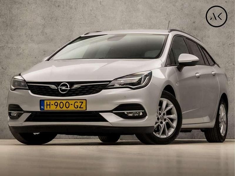 Grijs Gebruikt 2020 Opel Astra Business Edition Stationwagen | € 12.445 (Goede deal) - Afbeelding 1/4