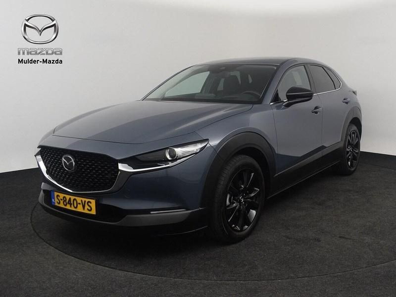 Polymetal gray (grijs metallic) Gebruikt 2023 Mazda CX-30 Homura-Line SUV | € 27.950 (Goede deal) - Afbeelding 1/4