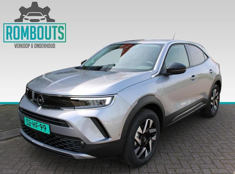 Grijs, metallic lak Gebruikt 2023 Opel Mokka-e Elegance SUV | € 24.750 (Iets duurder) - Afbeelding 1/4