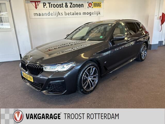 Grijs Occasion 2021 BMW 520 Executive Stationwagen | € 41.900 - Afbeelding 1/4