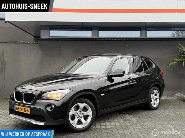Zwart Gebruikt 2010 BMW X1 Executive SUV | € 6.950 (Goede deal) - Afbeelding 1/4