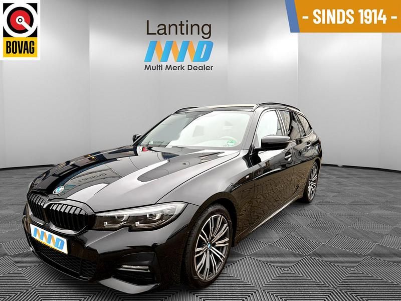 Zwart Gebruikt 2021 BMW 318 M Sport Stationwagen | € 25.495 - Afbeelding 1/4