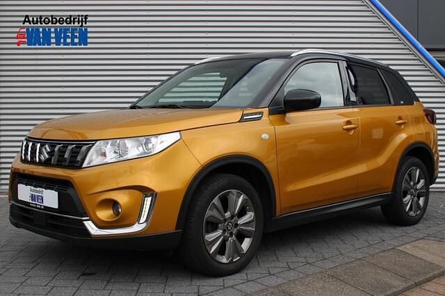 Geel, metallic lak Gebruikt 2019 Suzuki Vitara SUV | € 18.945 (Eerlijke prijs) - Afbeelding 1/4