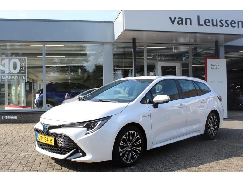 Wit Gebruikt 2019 Toyota Corolla Style Stationwagen | € 20.900 (Eerlijke prijs) - Afbeelding 1/4