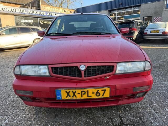 Occasion Lancia Delta 103 PK (75 kW) 1999 Rood Hatchback