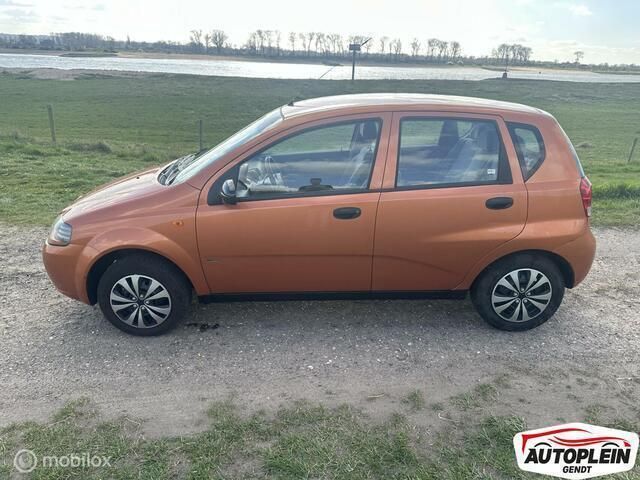 Oranje Gebruikt 2004 Chevrolet Kalos Hatchback | € 2.499 (Duur) - Afbeelding 1/4