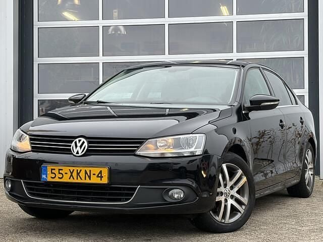 Zwart Occasion 2012 VW Jetta Executive Sedan | € 6.950 (Eerlijke prijs) - Afbeelding 1/4