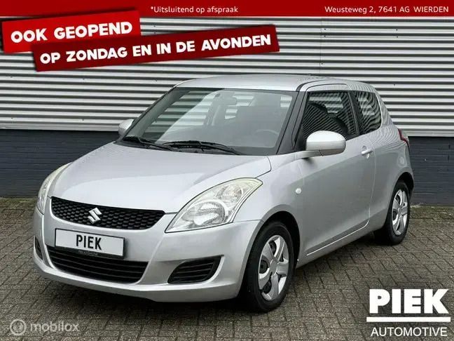 Grijs Gebruikt 2013 Suzuki Swift Comfort Hatchback | € 2.999 - Afbeelding 1/3