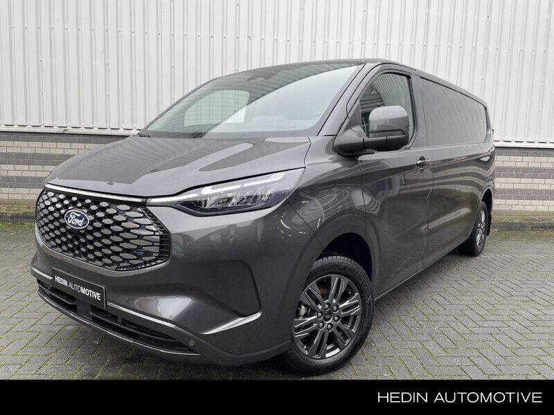 Grijs Nieuw 2024 Ford E-Transit Limited Van | € 48.230 (Eerlijke prijs) - Afbeelding 1/4