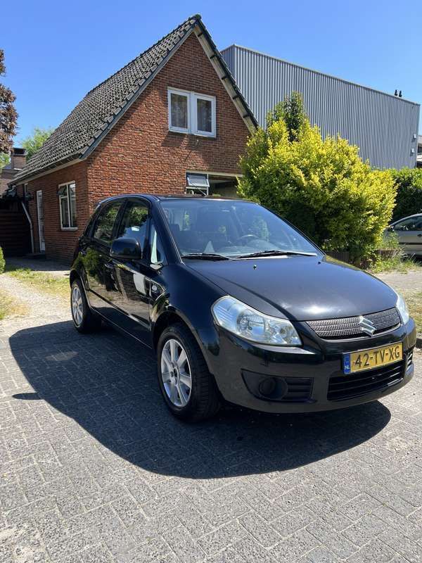 Zwart Gebruikt 2007 Suzuki SX4 Comfort Hatchback | € 1.599 (Eerlijke prijs) - Afbeelding 1/4