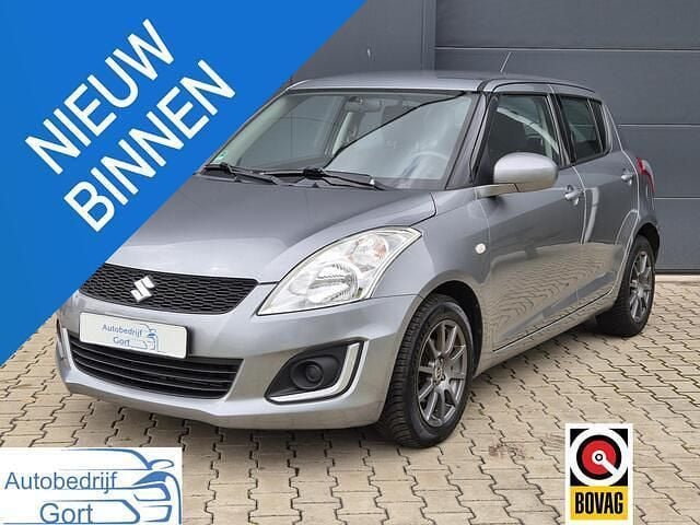 Grijs Gebruikt 2015 Suzuki Swift Hatchback | € 9.950 (Eerlijke prijs) - Afbeelding 1/4