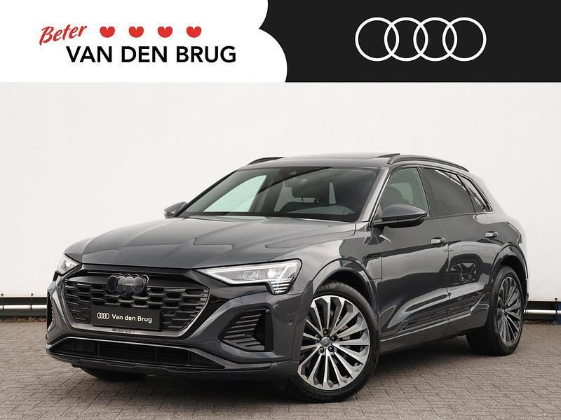 Grijs Gebruikt 2023 Audi Q8 e-tron Ambiente SUV | € 54.495 (Eerlijke prijs) - Afbeelding 1/4