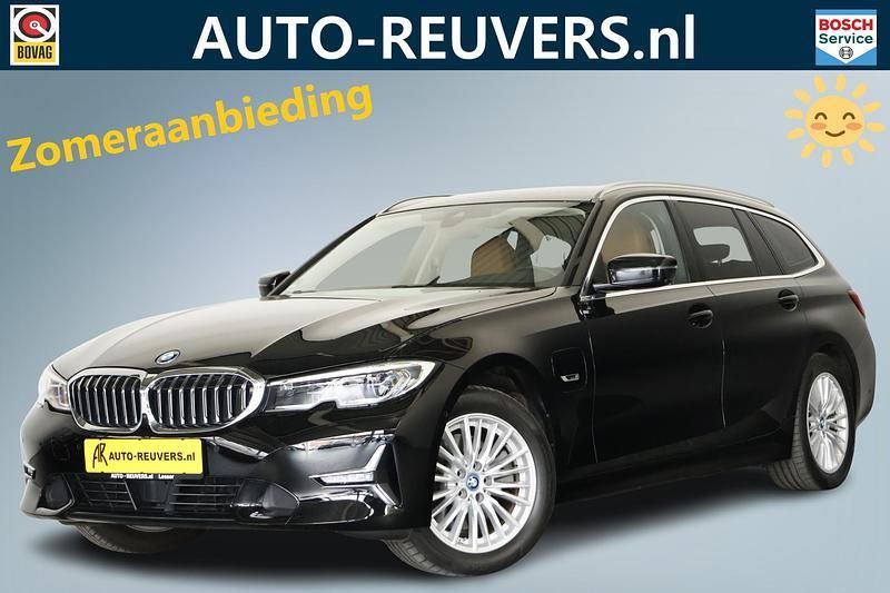 Zwart Gebruikt 2022 BMW 320e Executive Stationwagen | € 33.800 (Super prijs) - Afbeelding 1/4