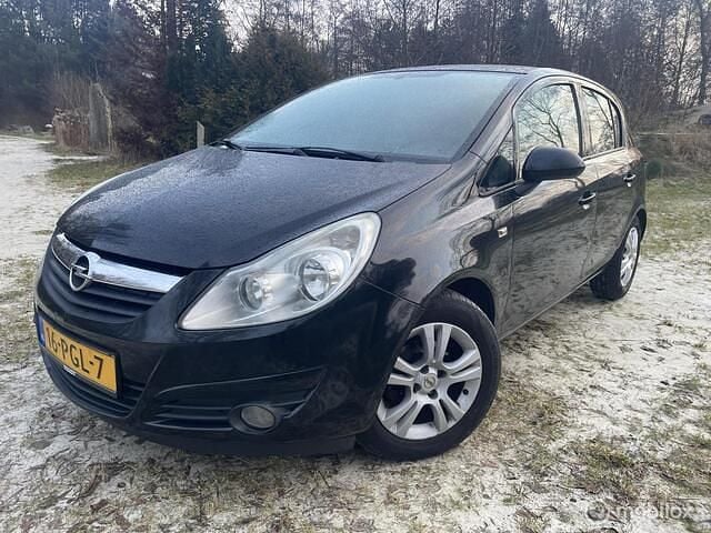 Zwart (metallic) Occasion 2010 Opel Corsa Cosmo Hatchback | € 1.599 (Super prijs) - Afbeelding 1/4