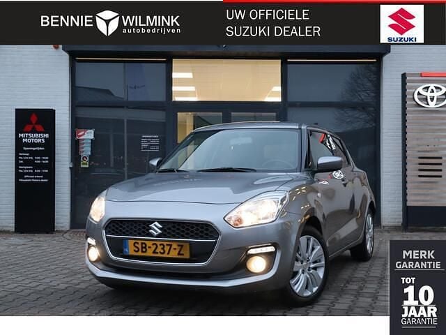 Grijs Occasion 2018 Suzuki Swift Hatchback | € 12.350 (Eerlijke prijs) - Afbeelding 1/4