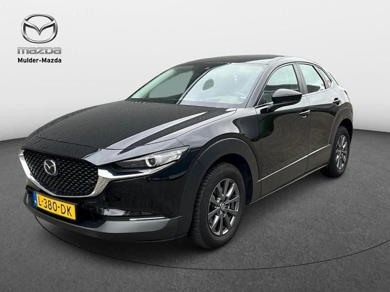 Jet black (zwart metallic) Gebruikt 2021 Mazda CX-30 Comfort SUV | € 20.950 (Goede deal) - Afbeelding 1/4