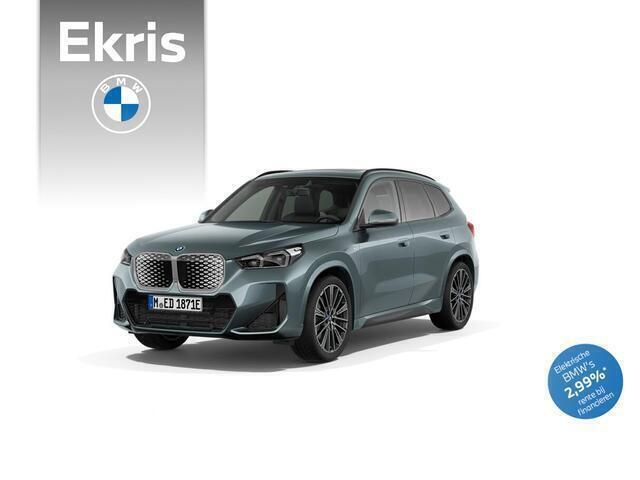 Groen, metallic lak Nieuw 2025 BMW iX1 M Sport SUV | € 62.261 (Eerlijke prijs) - Afbeelding 1/4