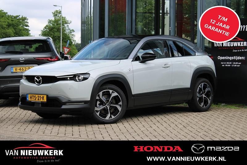 Cerermic white (wit mica) Gebruikt 2025 Mazda MX30 Ad'Vantage SUV | € 32.890 (Eerlijke prijs) - Afbeelding 1/4