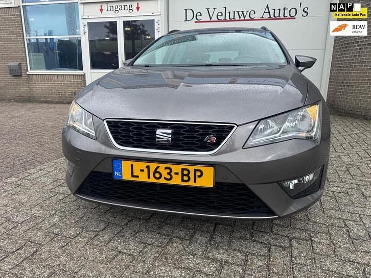 Grijs, metallic lak Gebruikt 2014 Seat Leon ST FR Stationwagen | € 12.900 (Goede deal) - Afbeelding 1/4