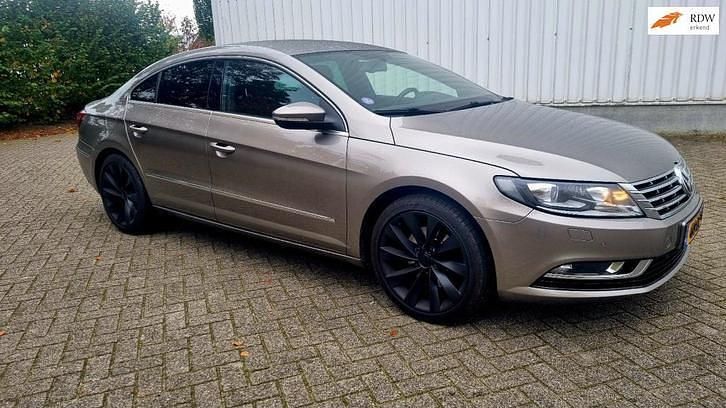 Bruin Gebruikt 2013 VW CC Sedan | € 8.750 (Goede deal) - Afbeelding 1/4