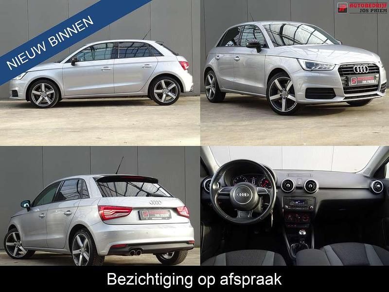 Grijs (metallic) Gebruikt 2015 Audi A1 Sportback Design Hatchback | € 13.250 (Eerlijke prijs) - Afbeelding 1/4