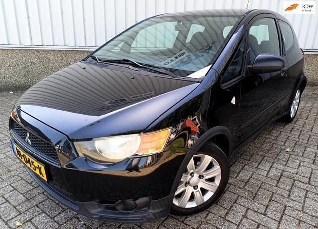 Zwart Gebruikt 2012 Mitsubishi Colt Hatchback | € 3.495 (Eerlijke prijs) - Afbeelding 1/4