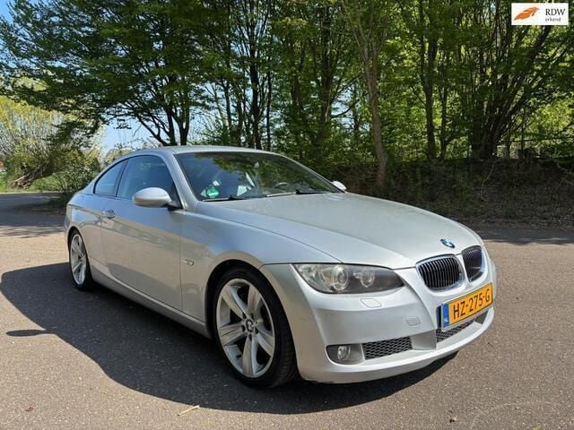 Grijs Gebruikt 2006 BMW 335 Executive Coupé | € 9.450 (Eerlijke prijs) - Afbeelding 1/4