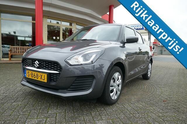 Grijs Gebruikt 2023 Suzuki Swift Comfort Hatchback | € 16.500 (Goede deal) - Afbeelding 1/4