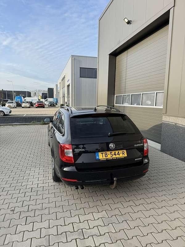 Occasion Skoda Superb Ambition 105 PK (77 kW) 2014 Zwart Stationwagen