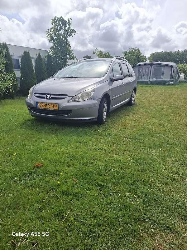 Grijs Gebruikt 2004 Peugeot 307 Stationwagen | € 1.200 (Eerlijke prijs) - Afbeelding 1/4