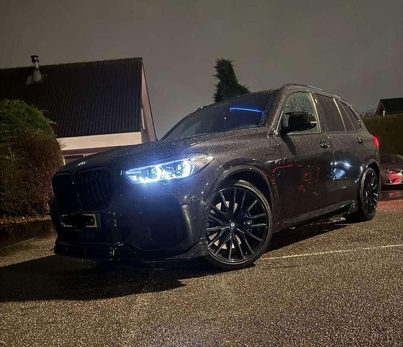 Zwart Occasion 2022 BMW X5 M Sport SUV | € 87.999 - Afbeelding 1/4