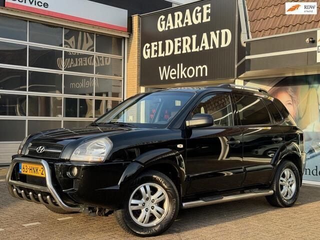 Zwart Gebruikt 2009 Hyundai Tucson Dynamiq SUV | € 3.800 (Eerlijke prijs) - Afbeelding 1/4