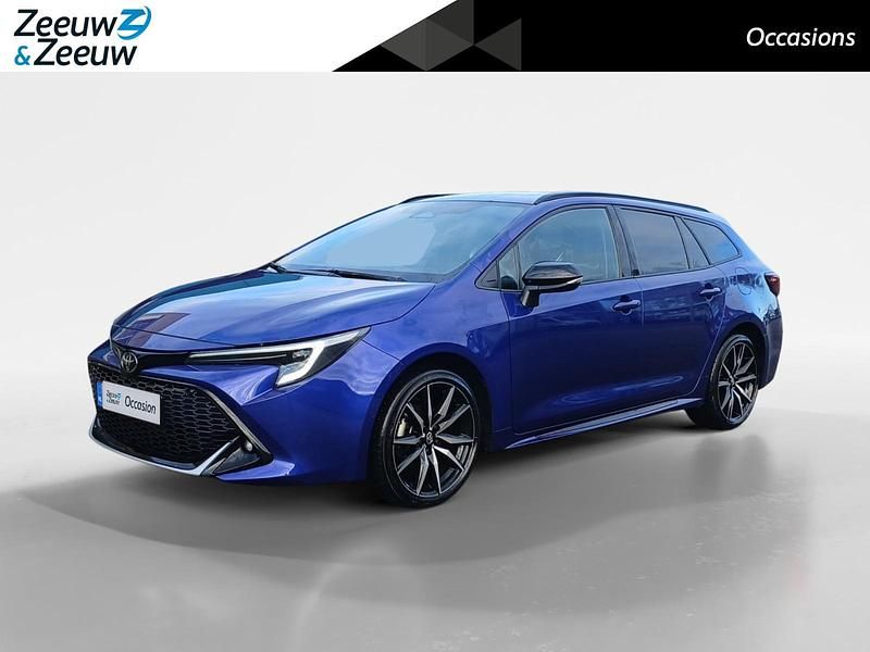Blauw Occasion 2023 Toyota Corolla Hybrid Sport Stationwagen | € 28.945 - Afbeelding 1/4
