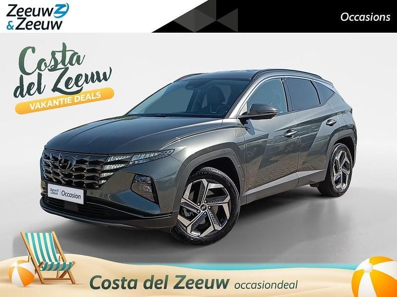 Amazon gray metallic (a5g) Gebruikt 2022 Hyundai Tucson Premium SUV | € 31.440 (Eerlijke prijs) - Afbeelding 1/4
