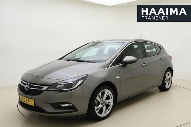 Bruin Gebruikt 2016 Opel Astra Innovation Hatchback | € 13.950 (Eerlijke prijs) - Afbeelding 1/4
